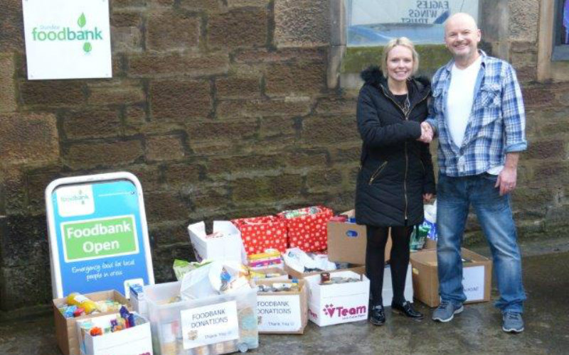 Dundee solicitor gives local food bank a festive boost