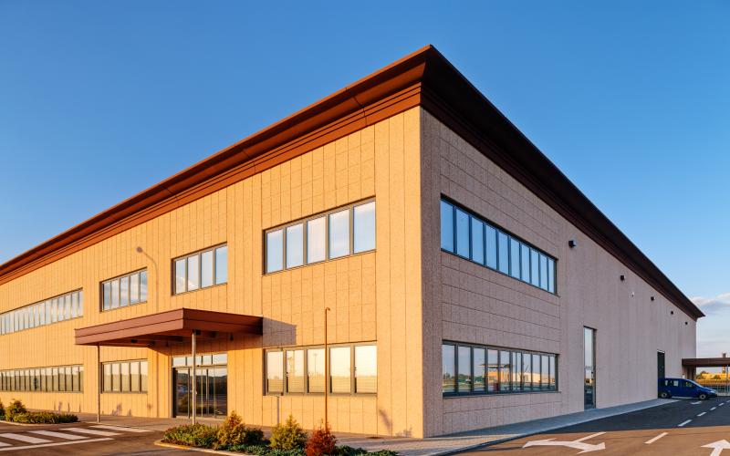 Outside corner of a brown commercial property building