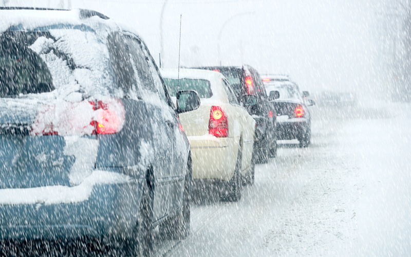 Cars driving in the snow