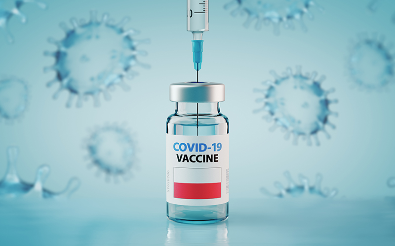 Covid Vaccine in front of an abstract blue background